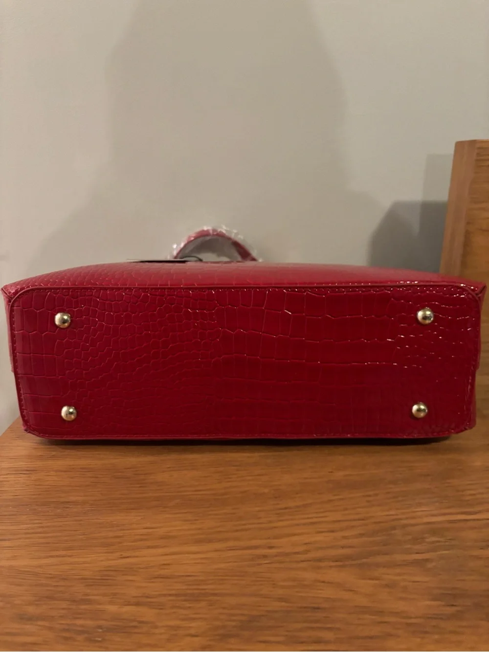 Vanessa Williams Lush round satchel vibrant red crocodile-embossed faux leather
